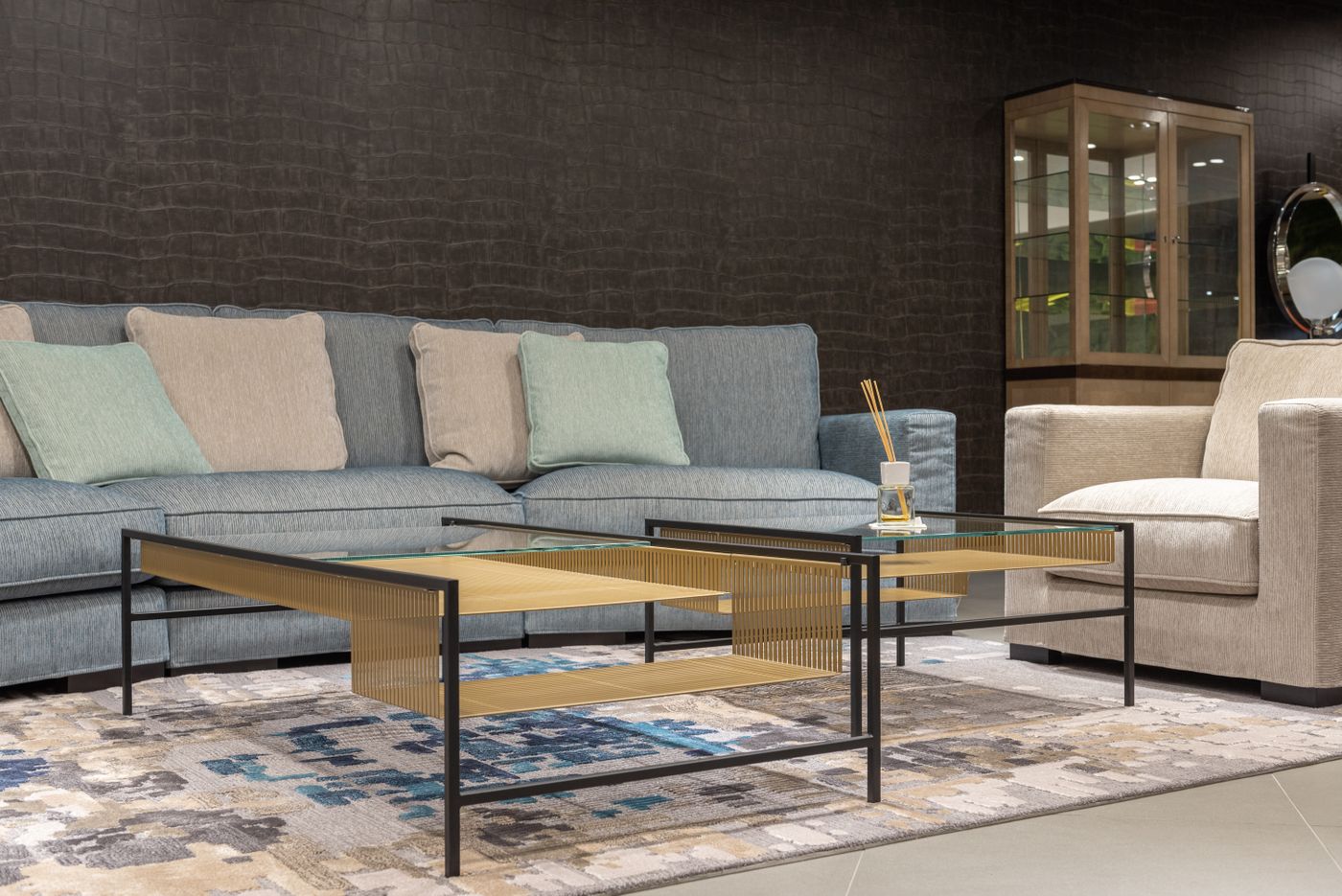 Living room furniture placed around rug